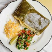 Tamales Hondureno · A tamale is a traditional mesoamerican dish made of masa (a starchy dough, corn-based), whic...