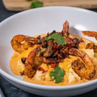 Shrimp & Grits · Stone milled grits jumbo shrimp smoked gouda red bell sofrito sauteed onions chipotle cream ...
