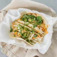 Shrimp Or Fish Tempura Tacos · Tempura fish or shrimp on soft flour tortillas with homemade guacamole, shredded cabbage/car...