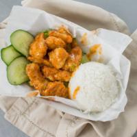 Chipotle Chicken · Crispy breaded chicken tossed in our creamy chipotle sauce. Served with steam rice, lettuce ...