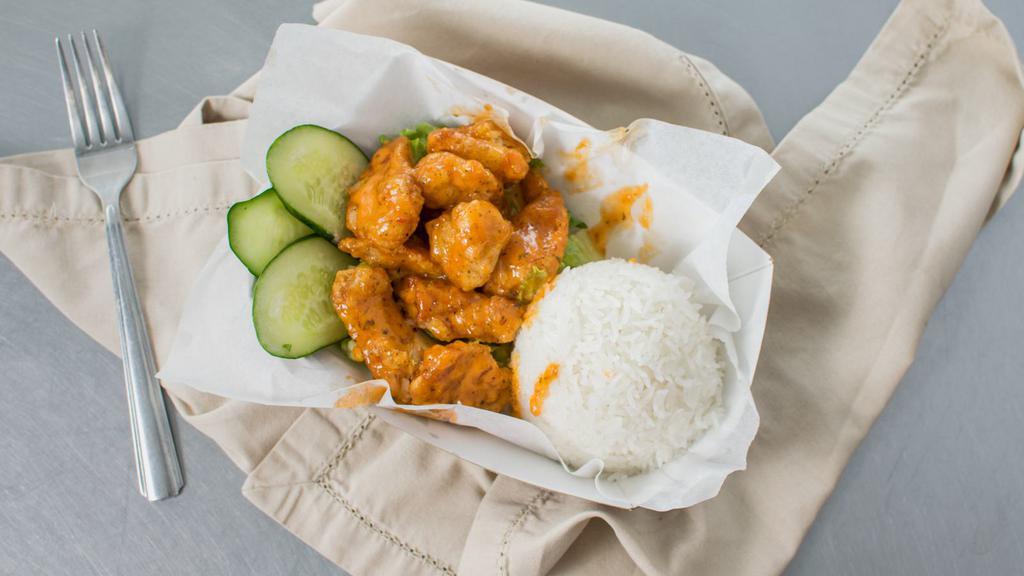 Chipotle Chicken · Crispy breaded chicken tossed in our creamy chipotle sauce. Served with steam rice, lettuce and cucumber.