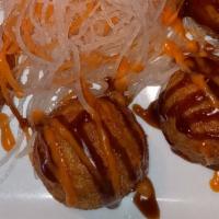 Tako Yaki · 6 pieces deep fried octopus dumplings topped with katsu sauce and spicy mayo