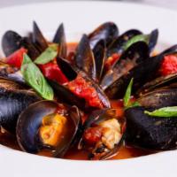 Mussels Marinara Entree · A full pound of blue mussels, simmered with fresh garlic, marinara and broth over pasta.