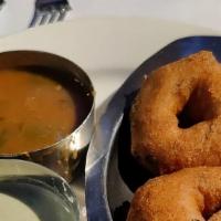 Medhu Vada · Vegetarian. Fried lentil donuts with sambar and coconut chutney on the side.