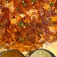 Chefs Special Uthappam · Topped with home made cheese, onion, tomato and peas.