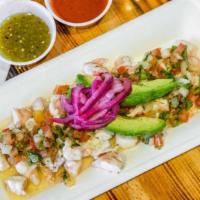 Ceviche Shrimp (Cold) · Shrimp, cured in lime juice, mixed with tomatoes, jalapeno pepper, onions, and cilantro. Top...