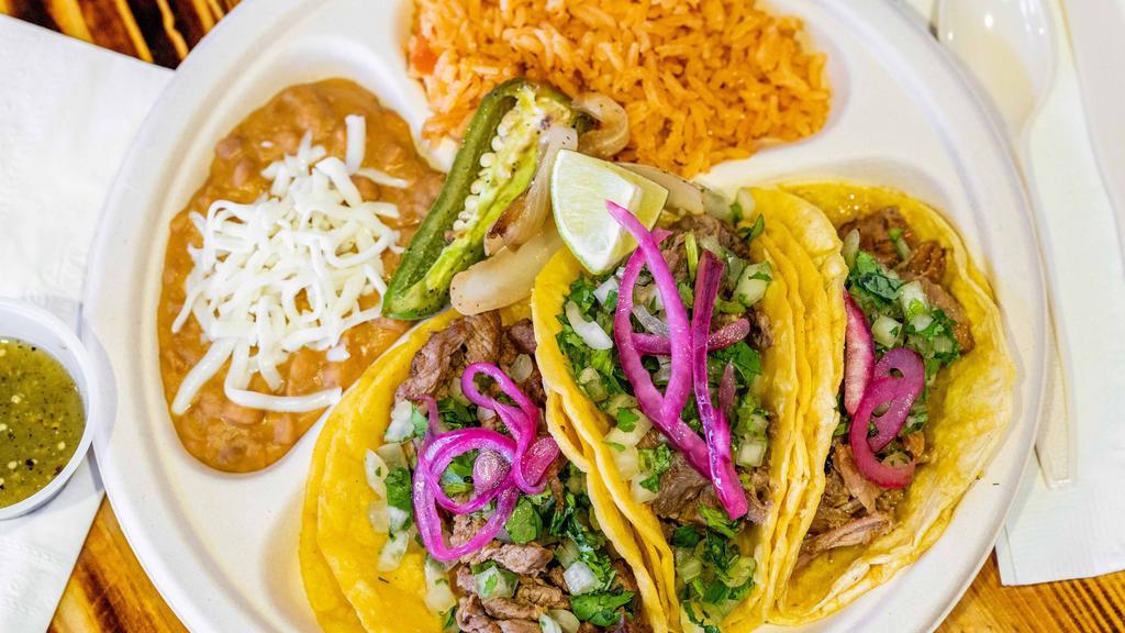 Tres Tacos Callejon · Served with rice, beans, cilantro, onions, and salsa.