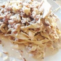 Spaghetti Carbonara · Sautéed onion, bacon ham and egg, tossed in Alfredo cream sauce.