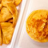 Hummus · Served with pita chips.

Consuming raw or undercooked meat such as poultry, fish, shellfish,...