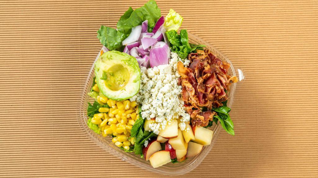 Cobb · Romaine apple, avocado, bacon, crumbled blue cheese, corn, red onion. Suggested dressing: walnut blue cheese