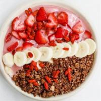 Pinky Swear Bowl · housemade almond milk, strawberry, banana, date. // topped with strawberry, raspberry, banan...