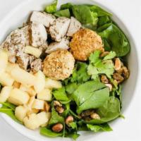 Tropical Chicken Salad · romaine, spinach, chicken, mango, pistachio, cilantro, pistachio dusted goat cheese medallio...