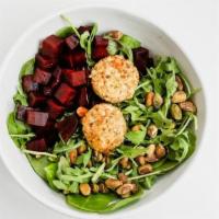 Arugula & Beet Salad · arugula, spinach, beets, pistachios, pistachio dusted goat cheese medallions. dressing: roas...