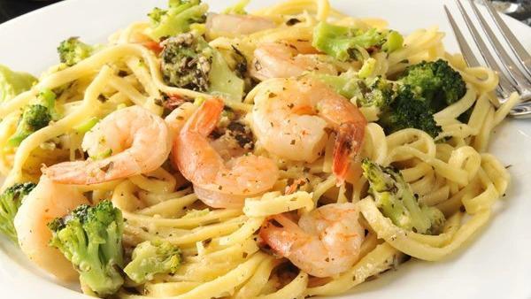Shrimp Alfredo · Small garden salad, garlic bread, alfredo sauce, broccoli, and shrimp.