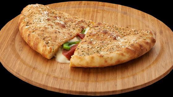 Calzone (Large) · Pizza cheese, ricotta, sauce on side, ham, and side marinara.