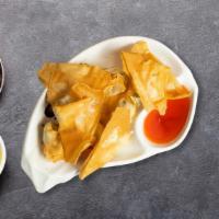 Crab Rangoon · French fries served with a delicious yellow curry dipping sauce.