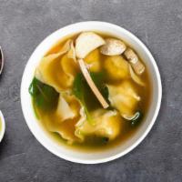 Wonton Soup · Marinated chicken wrapped in wonton skin with vegetables and crab meat soup.