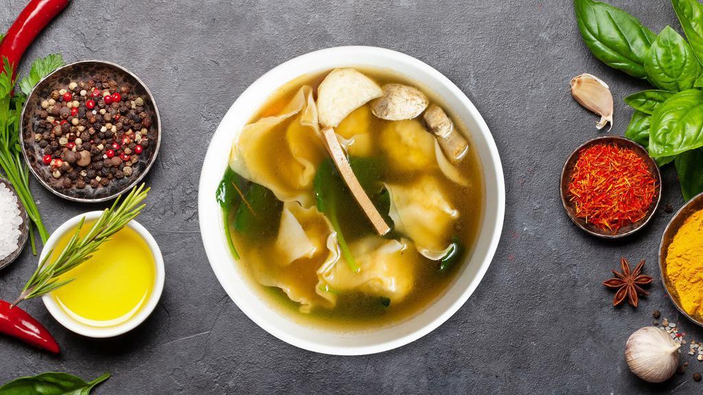 Wonton Soup · Marinated chicken wrapped in wonton skin with vegetables and crab meat soup.