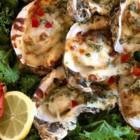 Oysters Rockefeller · George's own recipe! Five oysters stuffed with a creamy spinach and applewood bacon mixture,...