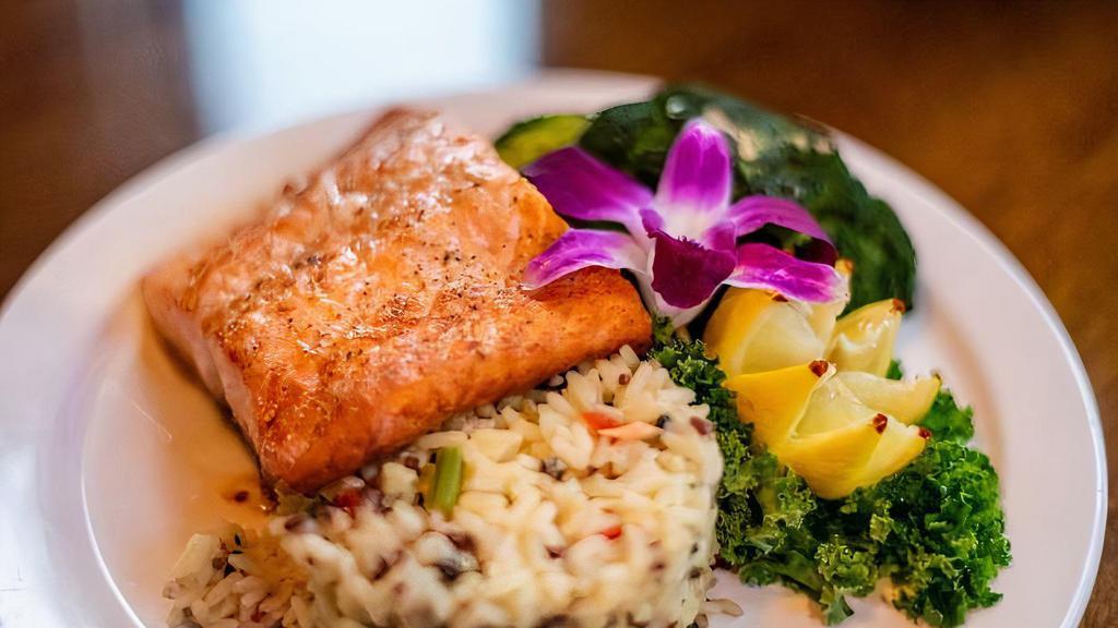 Salmon · Fresh North Atlantic salmon pan-seared to perfection. Served with broccoli and our house rice.