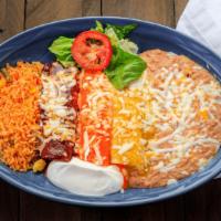 Lunch Enchiladas · Two soft corn tortillas stuffed with your choice of beef, chicken, cheese or chorizo. Served...