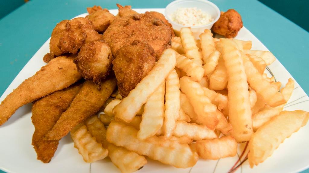 Shrimp & Scallops · Six pieces of shrimp and five pieces of scallops. Includes hush puppies, French fries.
