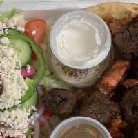 Chicken Kebab · Greek salad, hummus, tahini, pita.