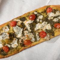 Caprese · Fresh mozzarella, grape tomato, roasted garlic infused olive oil, and basil pesto.