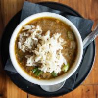 Chicken & Andouille Gumbo · Roasted chicken and smoked sausage in a rich gumbo gravy.