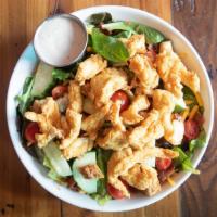 Southern Fried Chicken Salad · Fried chicken, bacon, cheddar, tomato, cucumber, mixed greens, croutons, and ranch dressing.