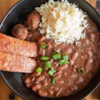 Creole Red Beans & Rice · Smoked sausage and jalapeño hushpuppies.