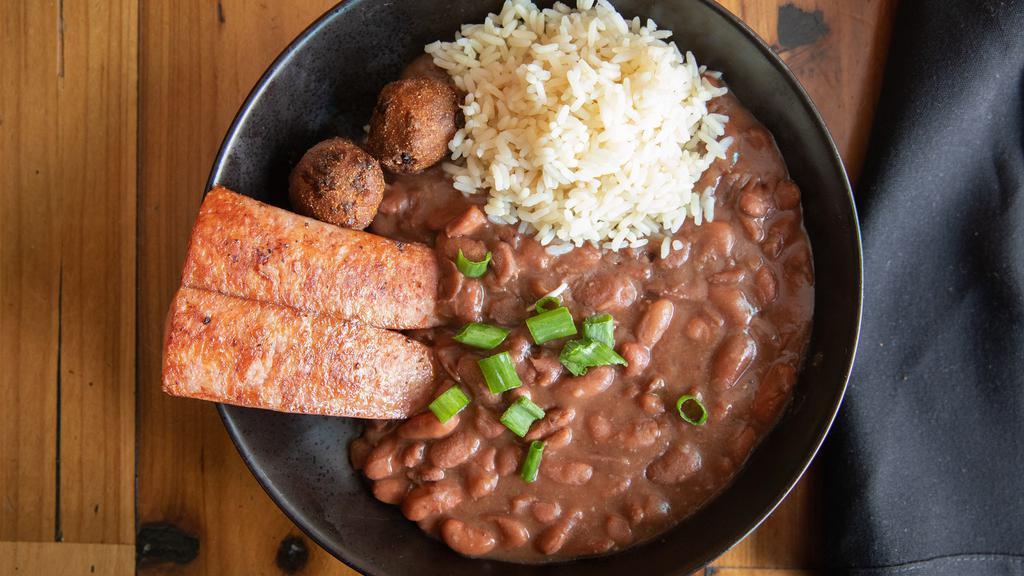 Creole Red Beans & Rice · Smoked sausage and jalapeño hushpuppies.