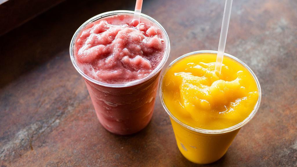 100% Fruit Smoothies · Choose from strawberry, mango, or a blend of the two. Made with real fruit and no artificial flavors, colors or sweeteners. Add banana upon request.