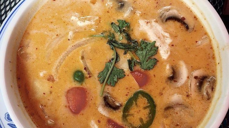 Tom Kha Chicken · Mushroom, onion, jalapeno, tomato, lime leaf and galanga in a spicy lemon grass and coconut broth.