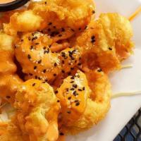 Bang Bang Shrimp Roll · Crab, cream cheese, avocado roll tempura fried. Sliced and topped with spicy mayo snowcrab m...