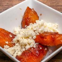 Side Of Sweet Plantains · Product of Costa Rica! 4 sweet plantains (platanos maduros) topped with queso fresco (fresh ...