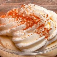 Signature Crema · Similar to a vanilla creme brulee custard topped with our housemade whipped cream & dusted w...