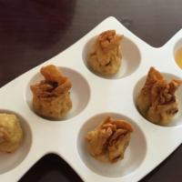 Money Bag (5) · Crispy pastry stuffed with chicken, peanuts, onion, chestnut, corn, and carrots served with ...