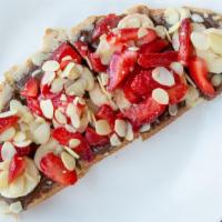 Nutella Lovers’ Toast · Sourdough, Nutella, banana, strawberries, and sliced almonds.