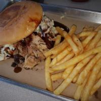 Pulled Pork Sandwich · Our award winning pulled pork served with coleslaw on a toasted bun.