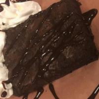 Chocolate Brownie · Warmed and served with chocolate sauce and whipped cream.