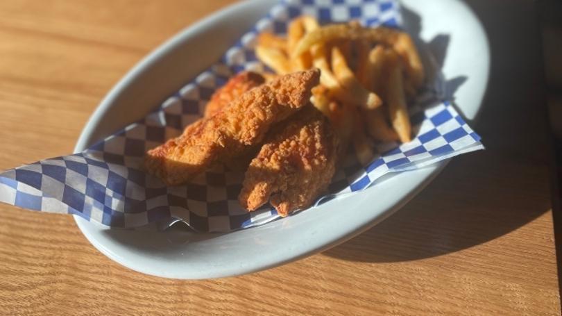 Kids Chicken Strips · Three crispy chicken tenders served with a choice of Apple Sauce or French Fries.