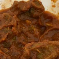 Lamb Curry · Lamb cooked in rich, aromatic traditional indian curry sauce. Gluten free.
