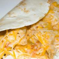 Cheesy Chicken · With Provolone, grilled onions, lettuce and honey mustard wrapped in a grilled pita.