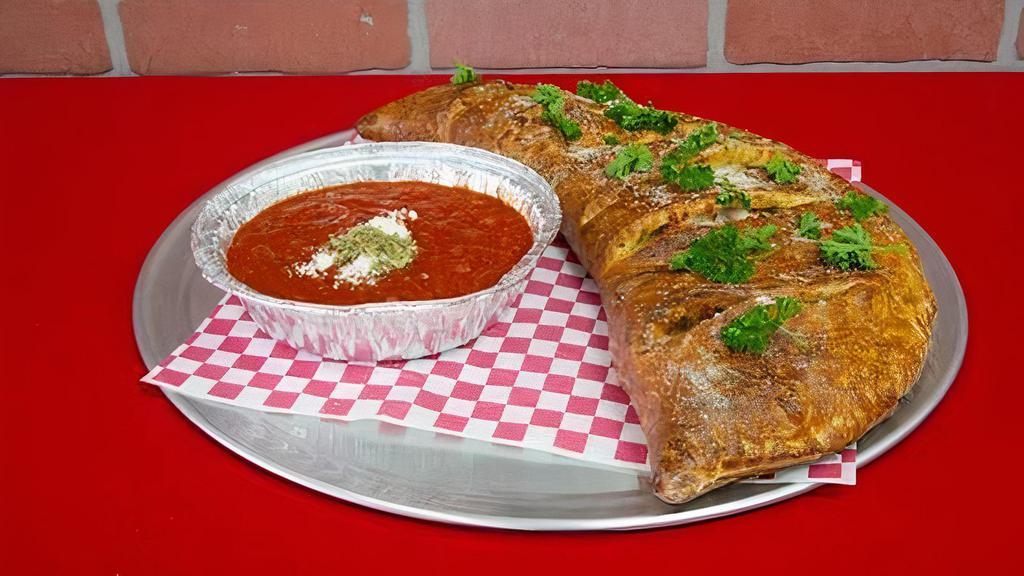 Large Calzone · With 2 topping.