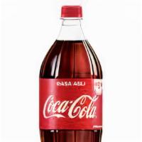Coke · (1) 16.9 oz coca cola