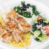 Chicken Kebab Platter · Comes with rice, salad, and pita bread.