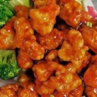 21  General Tso'S Chicken Combo · Served w. Roast Pork Fried Rice & Egg Roll. *Hot & Spicy.