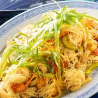 Singapore Noodle · Thin rice noodles stir fried with shrimp, chicken, roast pork egg, and vegetables in spicy  ...
