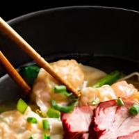 Roast Pork Wonton Noodle Soup · Roast pork, and six-piece wontons in a rice noodle soup.